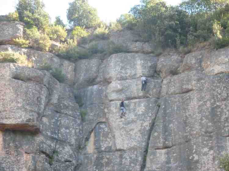 Rock climbers on Montserrat, one waving at us