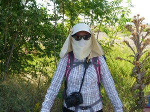 Tracy protecting herself from the dusty conditions she is about to encounter in the desert